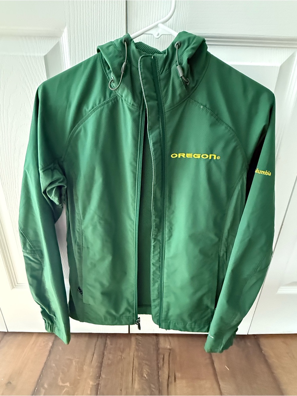 Columbia Women’s Hooded Windbreaker in Forest Green with Yellow Logo